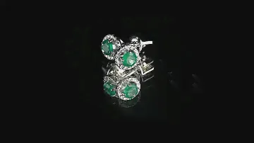 Серьги-пуссеты из белого золота с изумрудами 0,4 карат и бриллиантами 0,1 карат